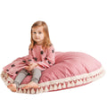 Coussin de sol à glands rose Minicamp